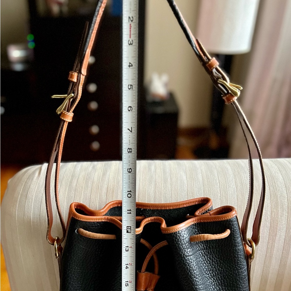 Vintage Dooney and Bourke Pebbled Leather Bucket Bag with brass accents - Picture 16 of 16